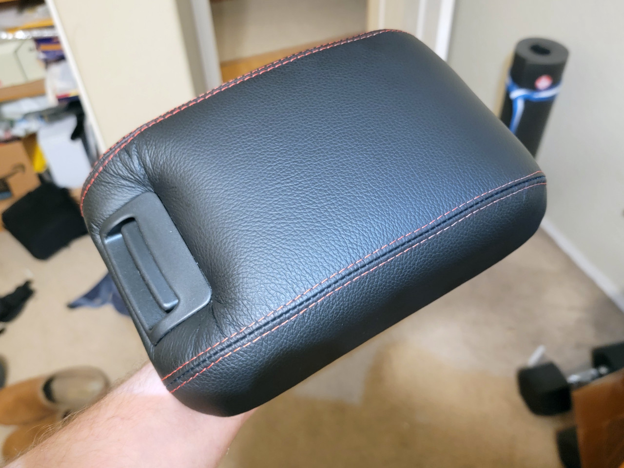 Installed armrest cover with padding